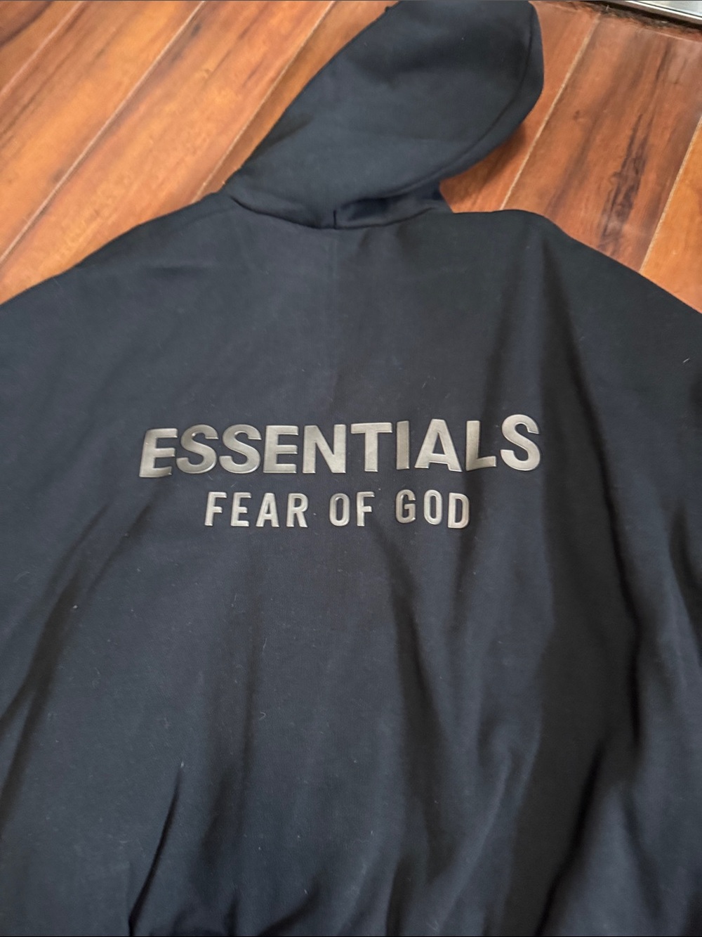 Essentials Men's Black Pullover Hoodie with Subtle Logo